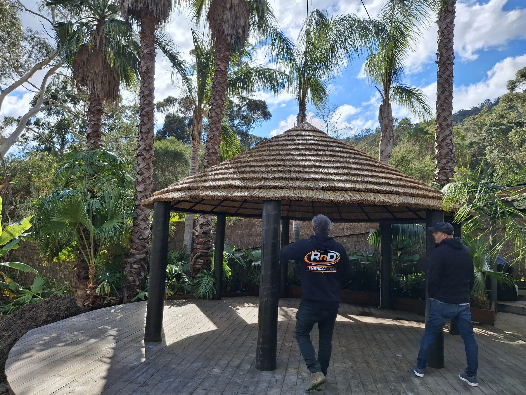 Large custom steel gazebo frame with thatch roof