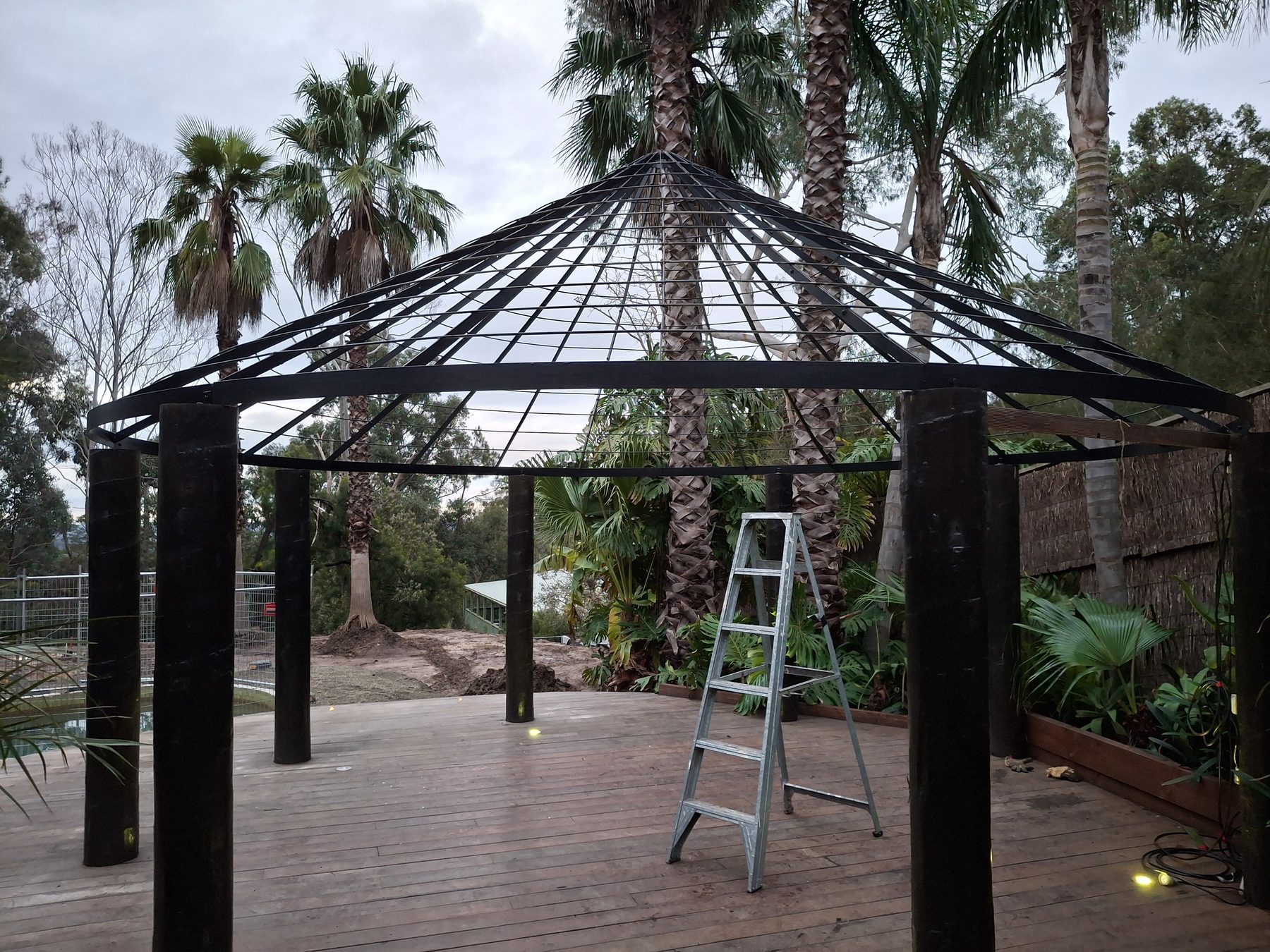 Custom fabricated steel gazebo frame on site